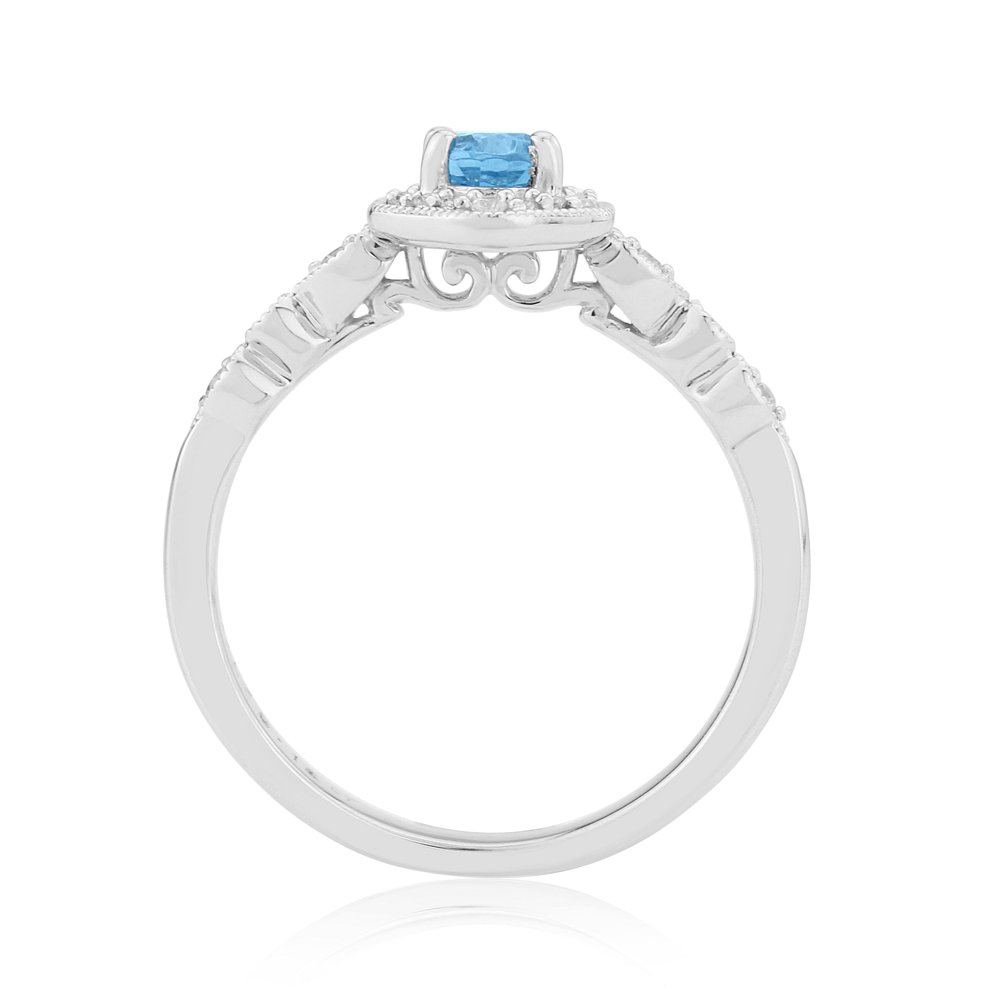9ct white gold 6x4mm oval blue topaz & diamond cluster ring 0.12ct