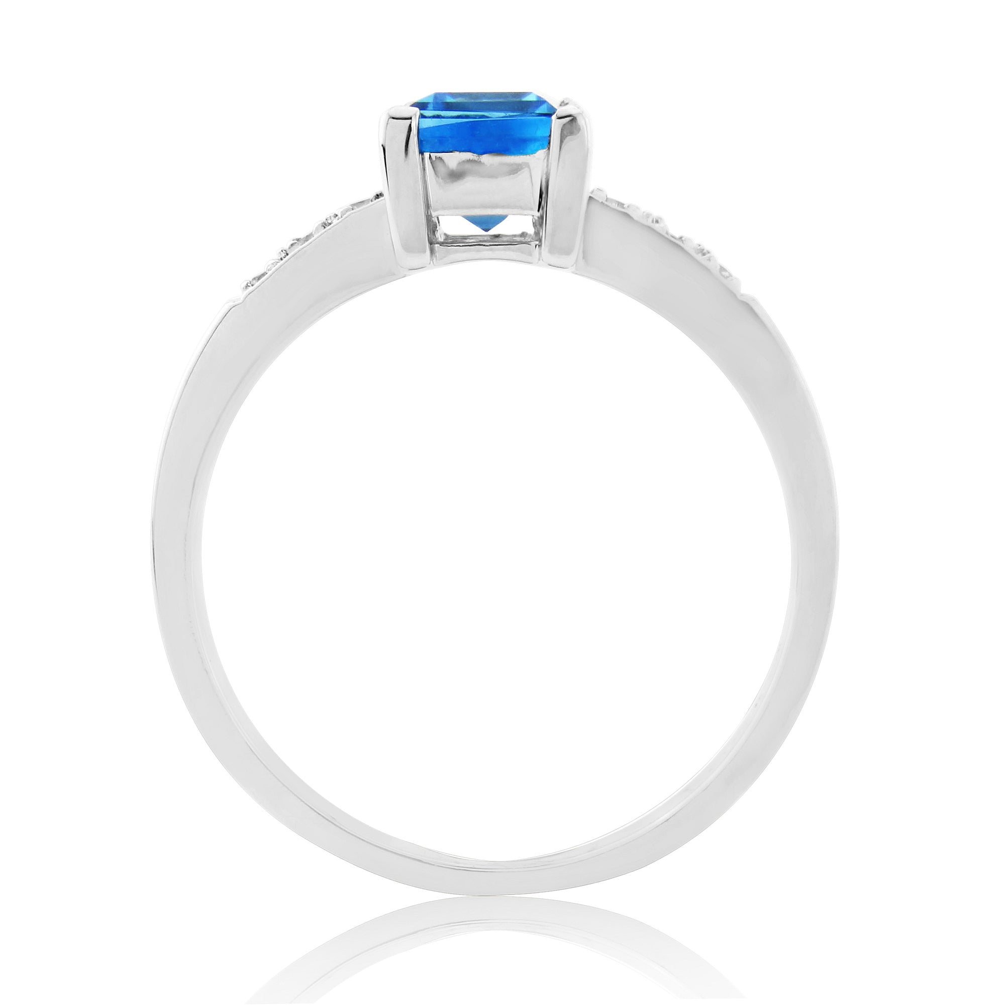 9ct white gold 7x5mm emerald cut blue topaz & diamond ring 0.03ct