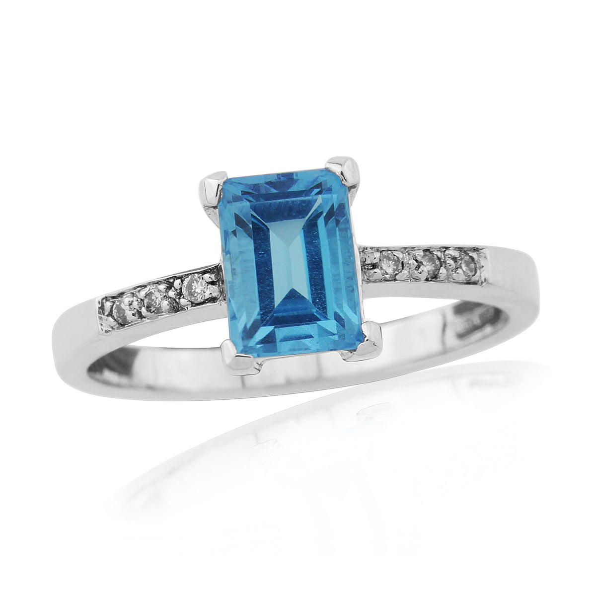 9ct white gold 7x5mm emerald cut blue topaz &amp; diamond ring 0.03ct